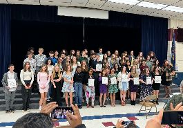 group of NJHS inductees pose for picture in large group